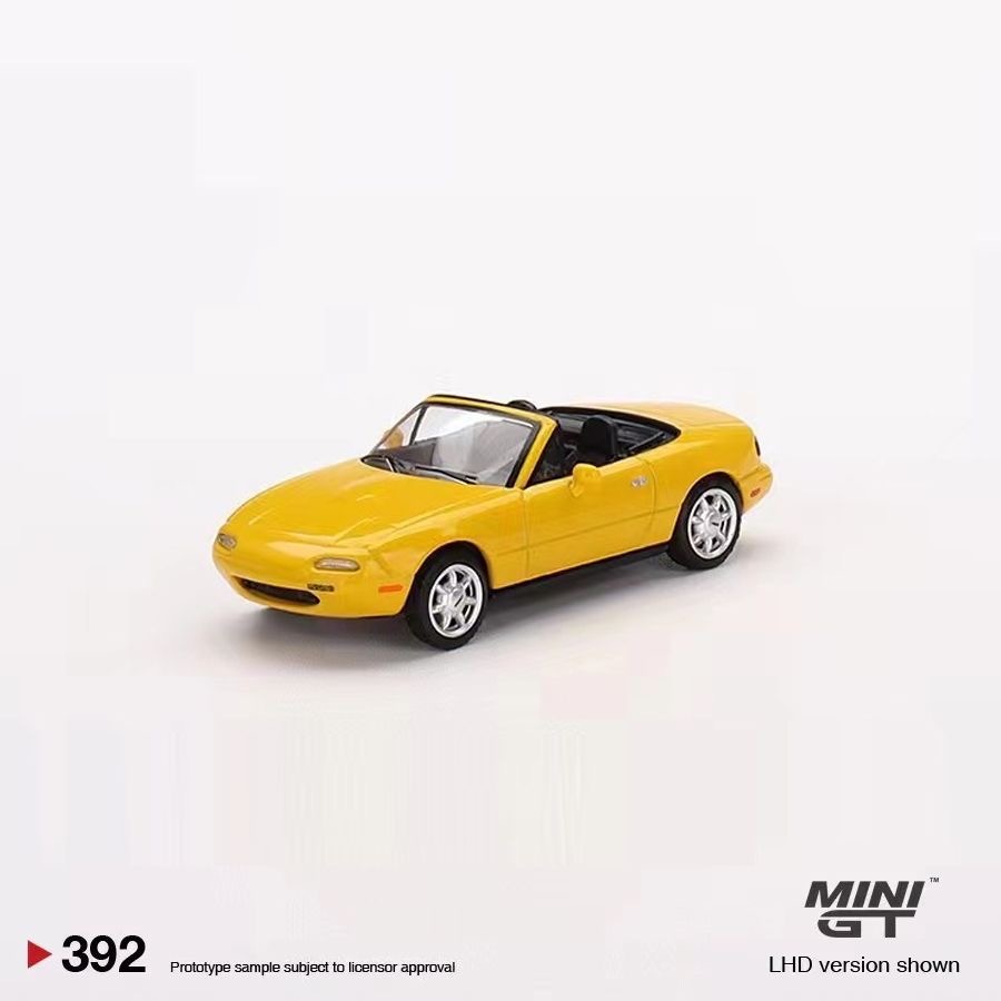 MINIGT 1: 64 Mazda MX-5 NA โมเดลรถโลหะผสมจําลองสีเหลืองเปิดประทุน #392