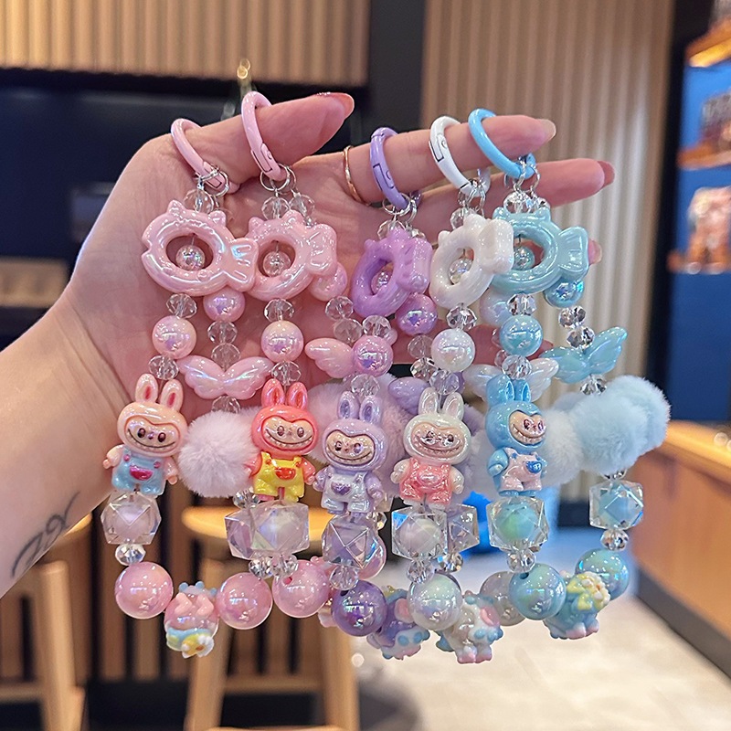 ใหม่น่ารักกระต่ายผมบอลลูกปัดโทรศัพท์โซ่สาวการ์ตูนโทรศัพท์สั้นเชือกแขวนระเบิดกระเป๋าแขวนของขวัญ