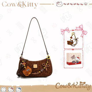 Cow&Kitty กระเป๋าสะพายข้างดีไซน์ครึ่งวงเดือน สีน้ำตาล พิมพ์ล…