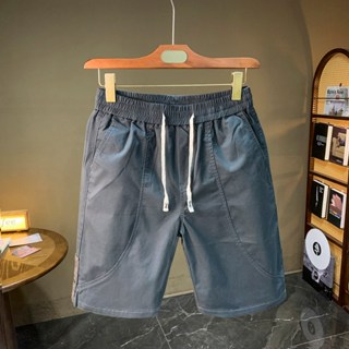 กางเกงขาสั้นผู้ชาย ความยาวถึงเข่า เอวยางยืด มีกระเป๋าลึก สไต…