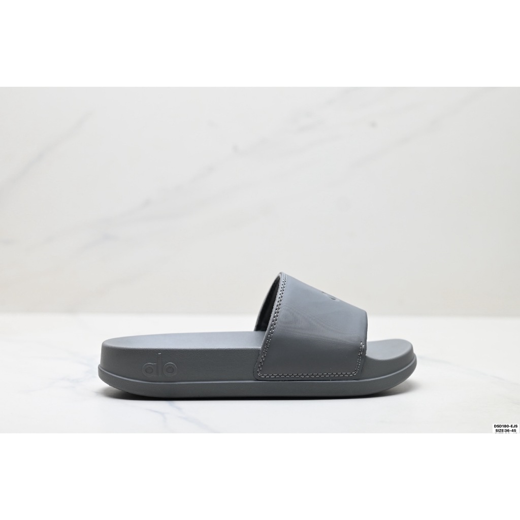 Alo Yoga รองเท้าแตะแบบสไลด์ Unisex It