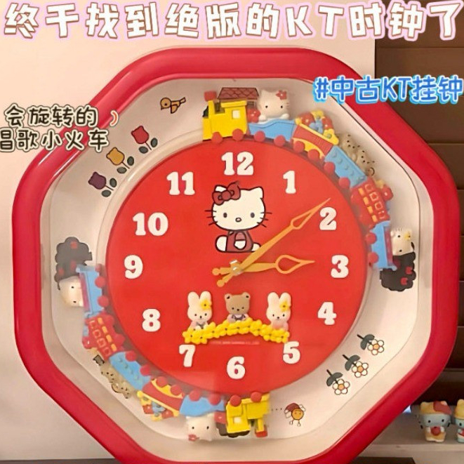 ใหม่ HelloKitty นาฬิกาแขวนการ์ตูนขนาดเล็กรถไฟนาฬิการถไฟในครัวเรือน HelloKitty นาฬิกานาฬิกาแขวน Fairy Tale World One