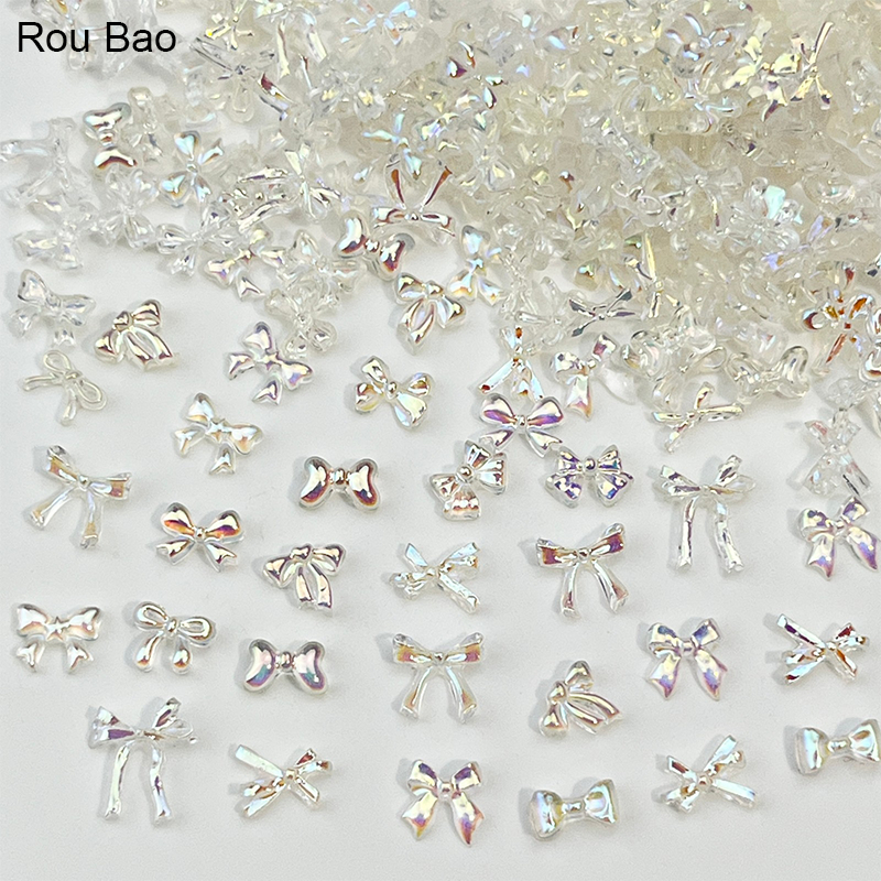 Rou Bao 100 ชิ้นเล็บ Mini Aurora Bow หลายประเภทผสมเล็บเรซิ่น Art DIY Charm อุปกรณ์ตกแต่ง