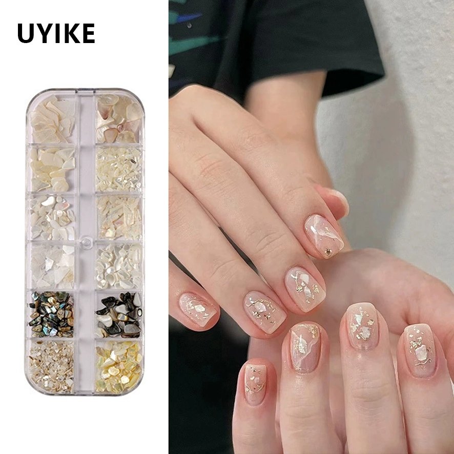 UYIKE Multi-สไตล์เล็บตกแต่งชุด Aurora Bow เครื่องประดับสําหรับเล็บผสมไข่มุกครึ่งรอบ Super Shiny Flat-back Rhinestones Shell Rhinestones