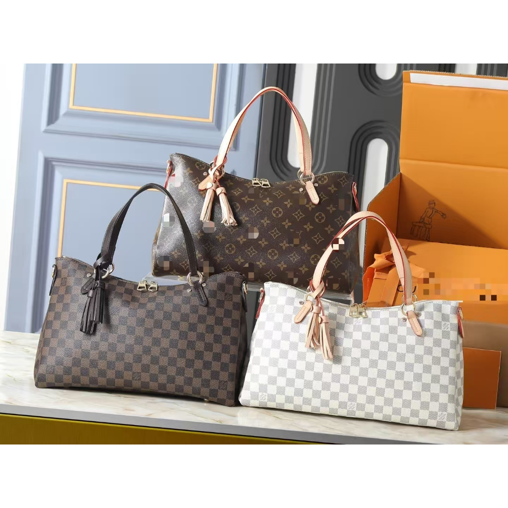 กระเป๋าถือแบบซิป มีสายสะพาย พกพาสะดวก ขนาด 35×24x14 ซม.
