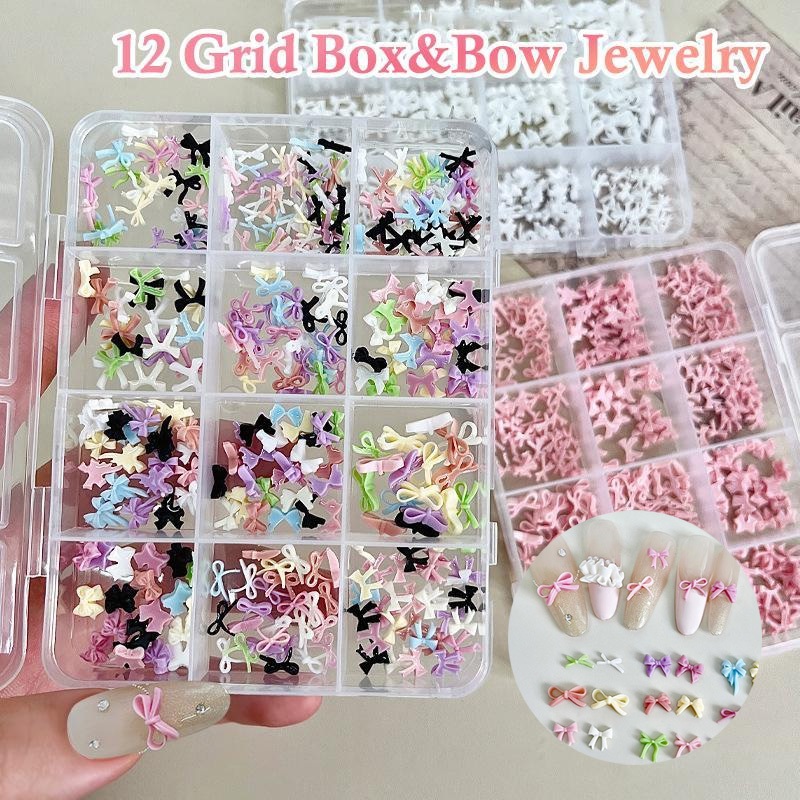 DSTH 12 กริดสีสัน Bowknot ชุดเรซิ่นริบบิ้นอุปกรณ์ตกแต่งเล็บ DIY เล็บ Mini เล็บอัญมณี HOT
