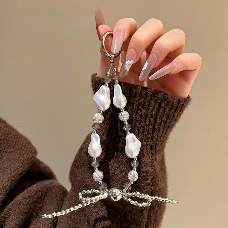 หรูหรา Y2K Baroque Pearl Diamonds Bowknot โทรศัพท์ Charm สายคล้องจี้สําหรับ iPhone สายคล้องเชือกเส้นเล็กสาวผู้หญิงกระเป๋าพวงกุญแจแขวน