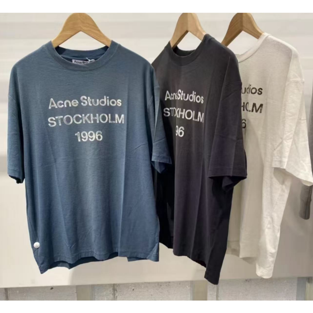 High-Quality Street WearลําลองหลวมRetro Sprayed Distressedรอบคอแขนสั้นเสื้อยืดผู้ชายผู้หญิงสไตล์เดียวกัน