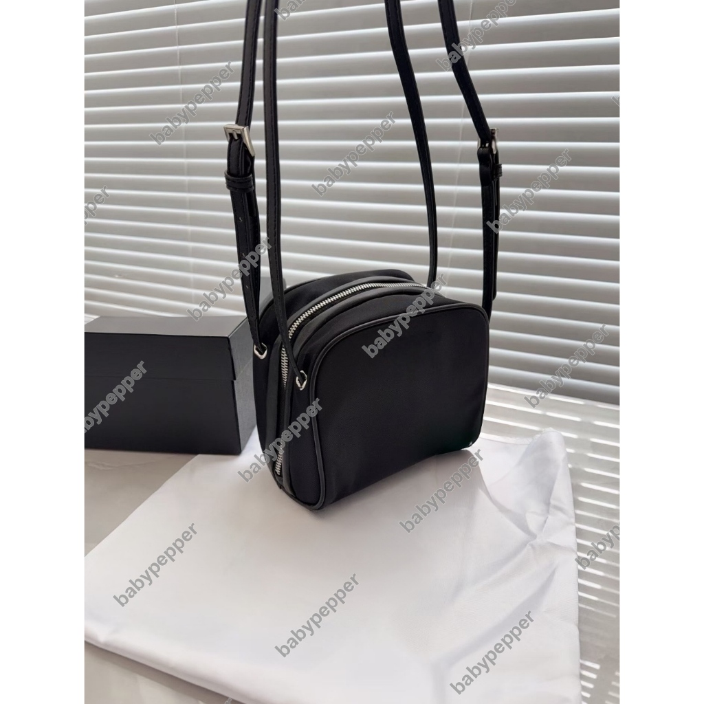 กระเป๋าสะพายไหล่เดียวอเนกประสงค์แฟชั่น unisex (ขนาด: 15x10x14ซม.; สายสะพายสูง: 25ซม.)
