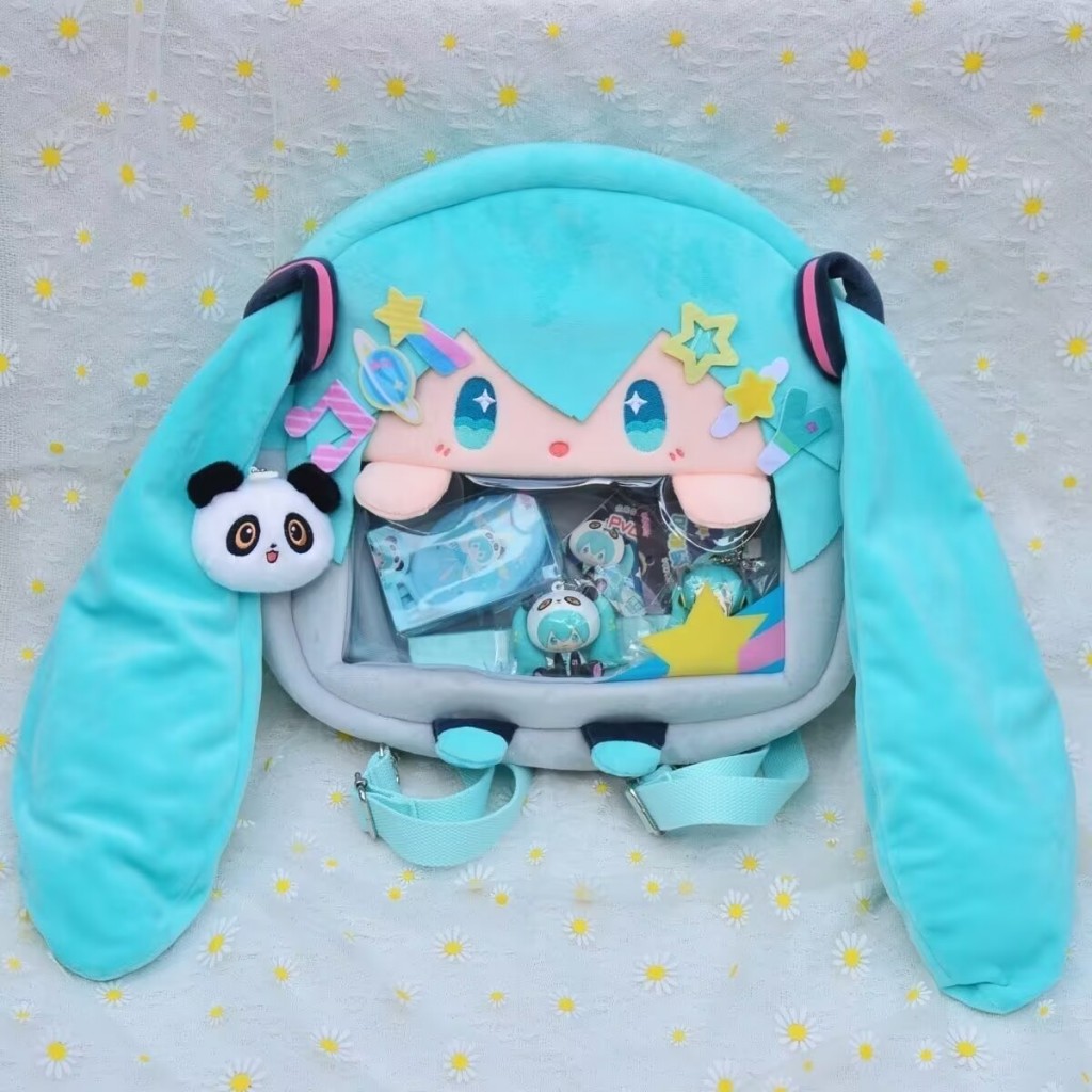 สาวอะนิเมะ Vocaloid Miku การ์ตูนน่ารัก Plush Outdoor Travel กระเป๋าเป้สะพายหลังกระเป๋านักเรียนนักเรี