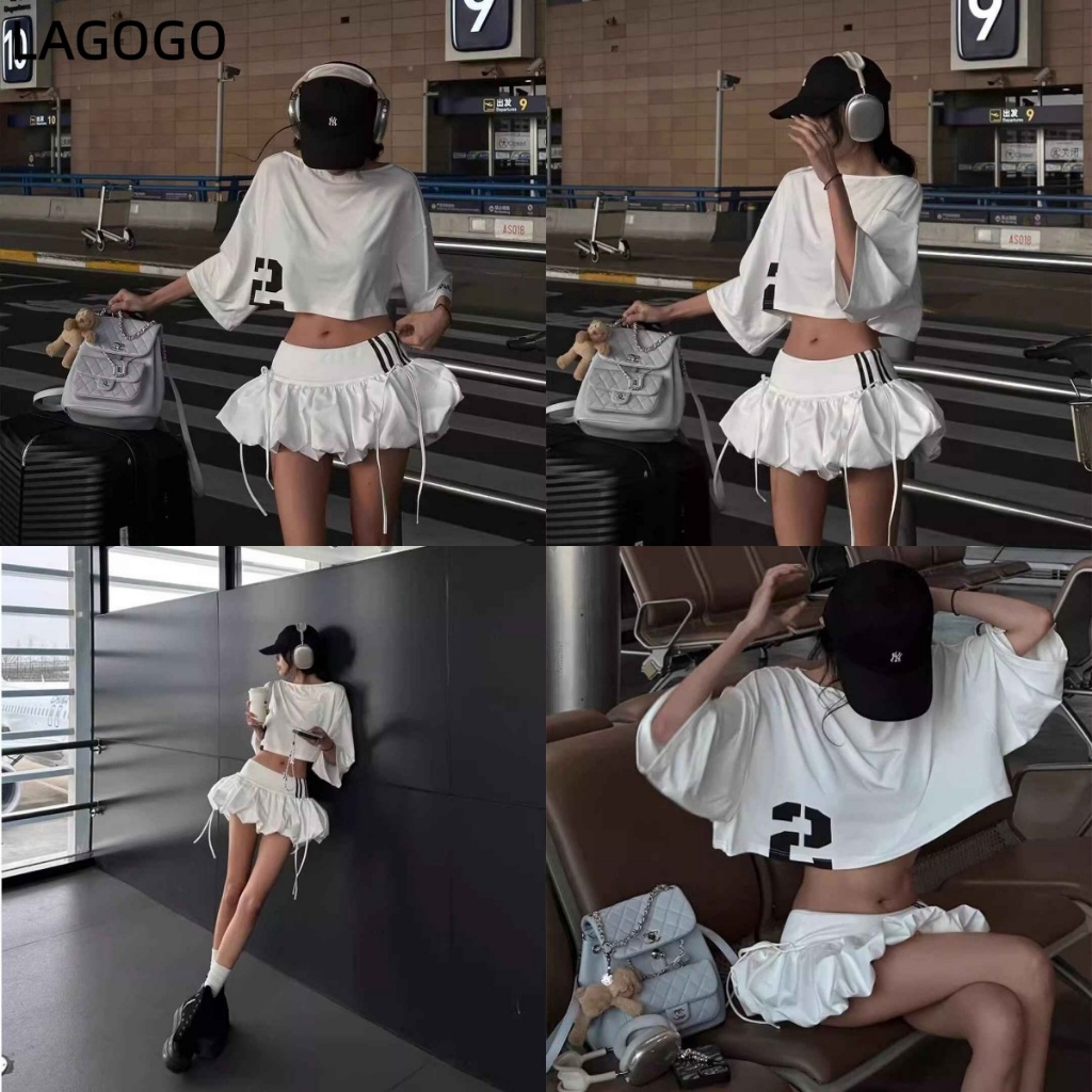 สาวร้อนสไตล์สีขาว A-Line Bud กระโปรงหญิงฤดูร้อนขนาดเล็กกระโปรงเอวต่ําหลวม