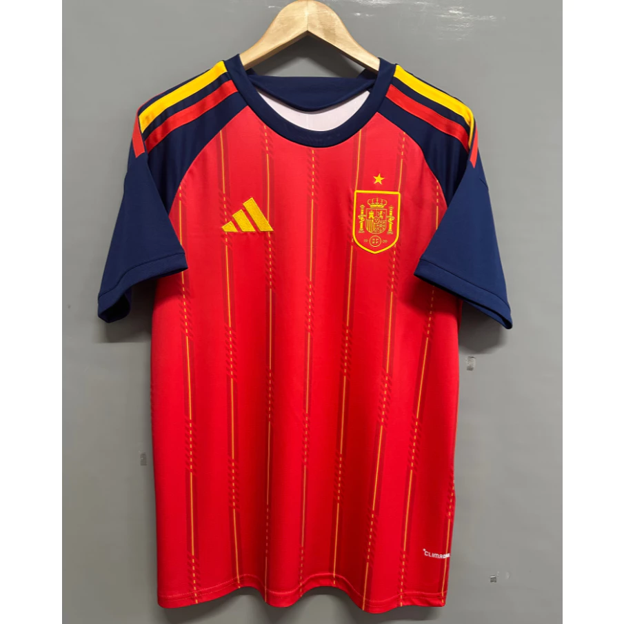 ปรับแต่งได้2026 สเปนเหย้า เสื้อเจอร์ซีย์ แขนสั้น กีฬาลําลอง เสื้อฟุตบอลฟุตบอลโลก