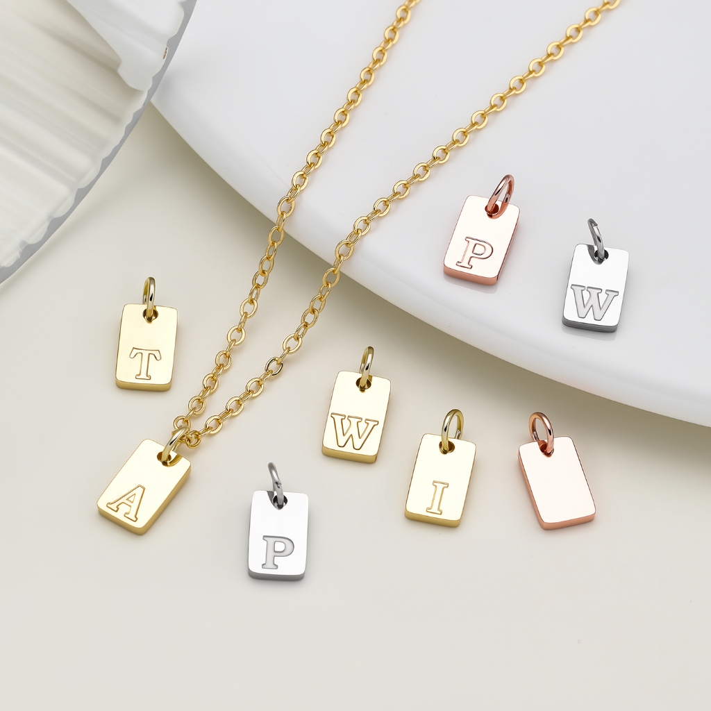 St. kunkka 1 ชิ้นสแตนเลสน้ํา Gold-Plated ไม่ง่ายที่จะจางหาย 6 * 10 มม.จี้ตัวอักษร DIY Handmade สร้อยข้อมือสร้อยคออุปกรณ์เสริม All-Match จี้ตัวอักษรเดี่ยว