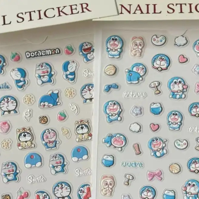 โดราเอมอนโดราเอมอนทําเล็บคู่มือสติกเกอร์ทิงเกอร์เบลล์แมวนูนสามมิติเคสโทรศัพท์นักเรียนทําเองที่ใส่ปากกาถ้วยน้ําสติกเกอร์กล้อง