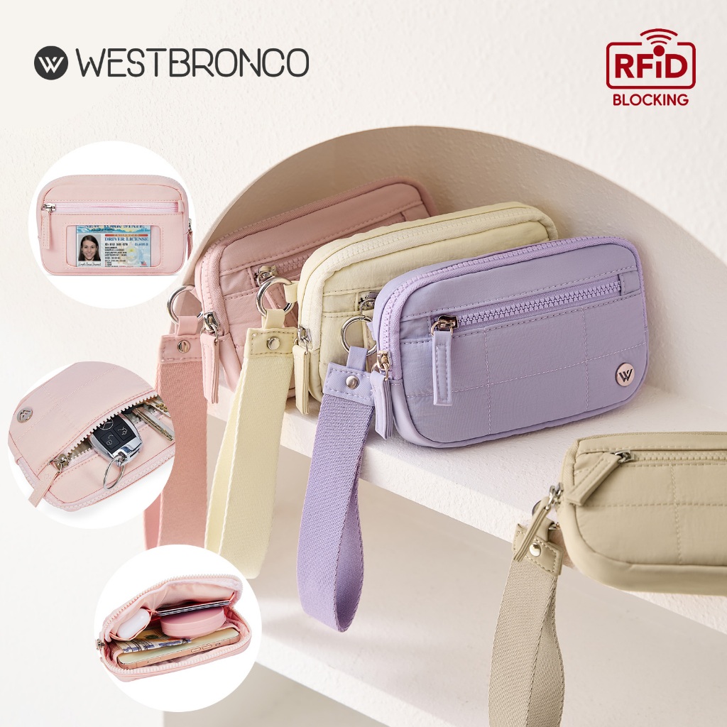 WESTBRONCO รุ่นWestlet (เวสเล็ต)กระเป๋าสตางค์แบบคล้องข้อมือสำหรับผู้หญิง ผลิตจากผ้าไนลอน สามารถสแกนข้อมูลบัตรได้ (RFID) มาพร้อมช่องซิป 3 ช่อง เหมาะสำหรับพกพาใส่บัตร โทรศัพท์ และของใช้ระหว่างเดินทาง