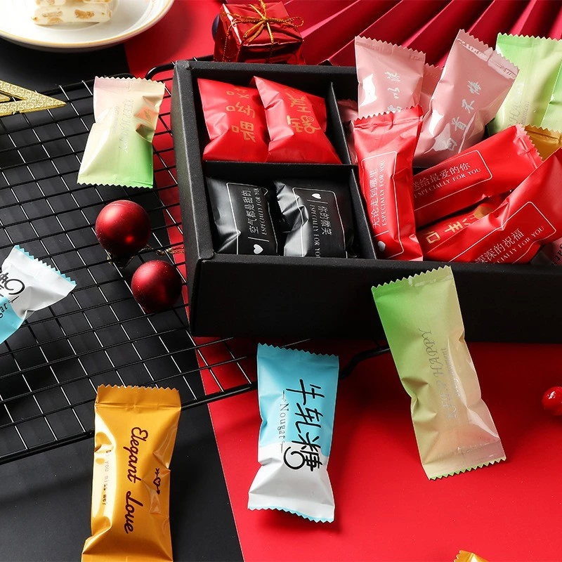 100 ชิ้นการ์ตูน DIY Handmade Nougat ถุงขนมนม Candy Taffy Wrapper แพคเกจพลาสติก 4x9.5 ซม.