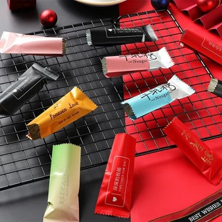 100 ชิ้นการ์ตูน DIY Handmade Nougat ถุงขนมนม Candy Taffy Wrapper แพคเกจพลาสติก 4x9.5 ซม.