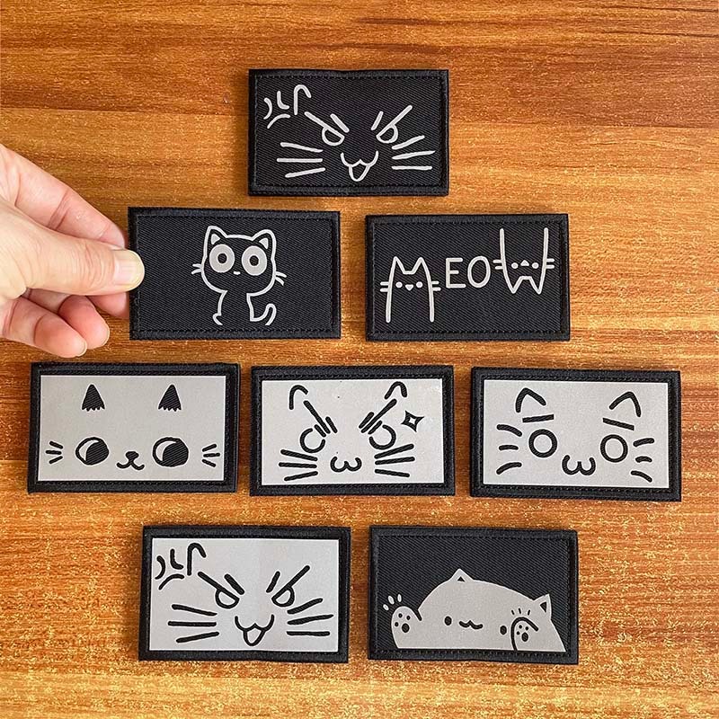 IR แพทช์สะท้อนแสงพร้อมตะขอและห่วง,การ์ตูนน่ารักแมวแสดงออกตราขวัญApplique,แมวตลกMowสติกเกอร์สัญลักษณ์ยุทธวิธีสําหรับกระเป๋าเป้สะพายหลัง,เสื้อผ้า,ปลอกแขน