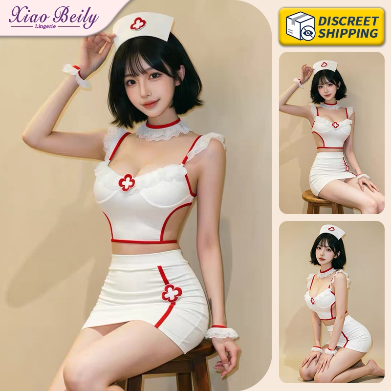 XiaoBeily ชุดคอสตูมพยาบาลสองชิ้นสำหรับผู้หญิง สายเดี่ยวลูกไม้ โลโก้กากบาท กระโปรงรัดรูป สไตล์น่ารักบริสุทธิ์