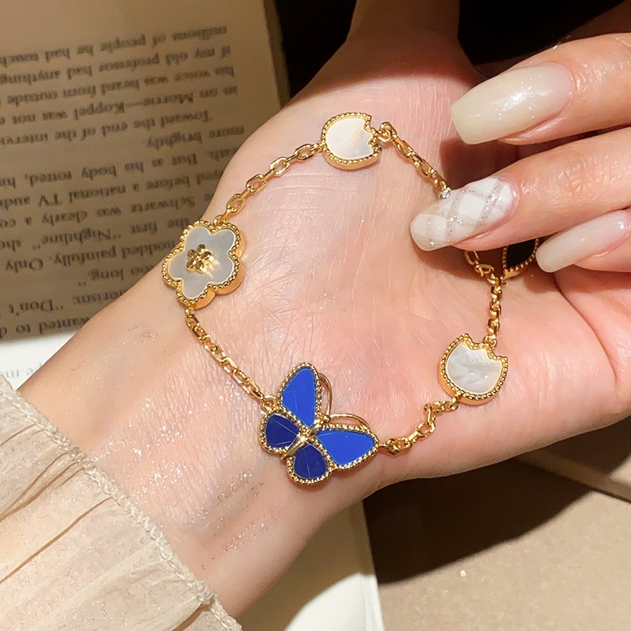 ชุดแหวนสร้อยข้อมือผีเสื้อชุบไฟฟ้าเซอร์โคเนียม mother-of-pearl สไตล์เกาหลีขนาดกะทัดรัด เรียบง่าย ชุดอุปกรณ์เสริมผสมแฟชั่นและหลากหลาย