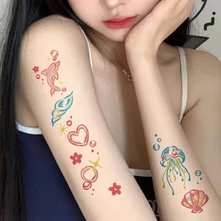 รอยสักลายปลาโลมาน้อยสีชมพูเซ็กซี่สาวแขนสักสติกเกอร์รอยสักกันน้ําติดทนนาน 7 วันสติกเกอร์ผิวรอยสักปลอมชั่วคราว