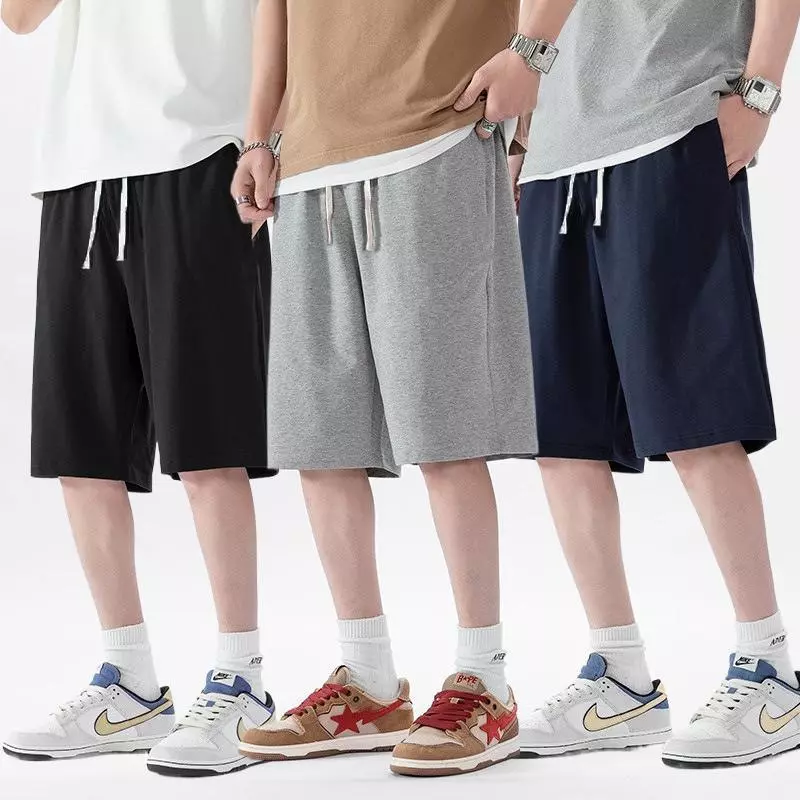 MEFEEE กางเกงขาสั้นผู้ชาย เอวยางยืด ทรงหลวมสบาย ผ้าฝ้ายสีทึบ 5XL สไตล์สตรีท เหมาะเล่นกีฬา