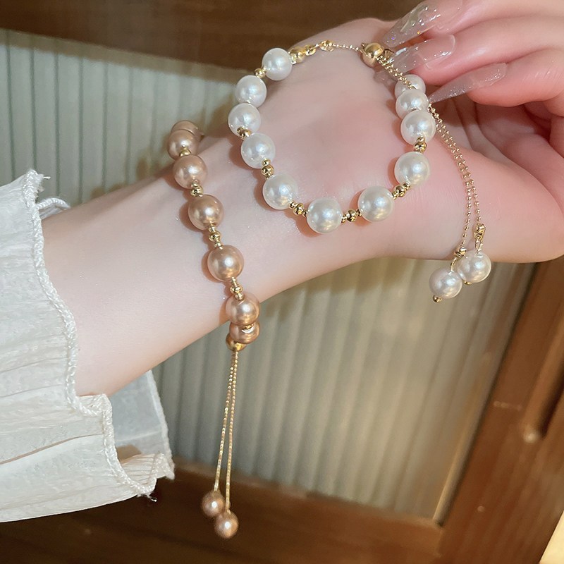 สร้อยข้อมือปรับมุกเทียมหลายชั้นเกาหลีเรียบง่ายหรูหราแฟชั่นการออกแบบเฉพาะอเนกประสงค์อุปกรณ์เสริมปาร์ตี้ทุกวัน