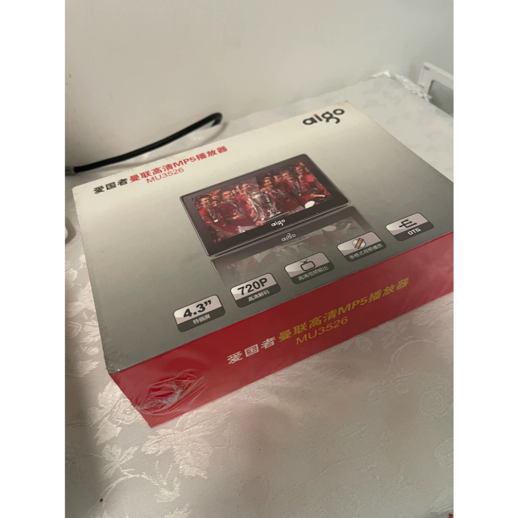 เครื่องเล่น MP3/MP4 aigo MU3526 – Manchester United Edition, 4GB, ซีลใหม่ #VintageAudio #MP4Player #