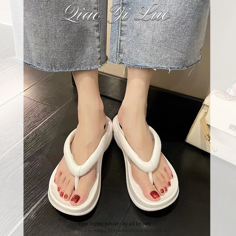 Qiaoyiluo รองเท้าแตะคลิปนิ้วเท้าใหม่ของผู้หญิงเกาหลีใต้ทงแดมุนลิ่มและสวมใส่ด้านนอกลําลองแฟชั่นรองเท้าแตะด้านล่างหนา 3 สีตัวเลือก
