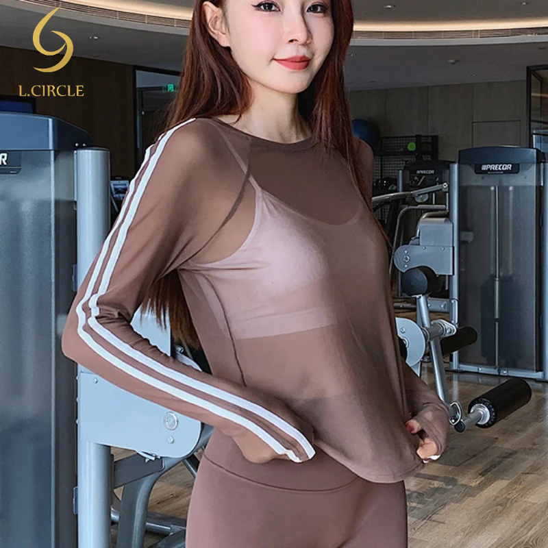 เสื้อยืดแขนยาว ทรงหลวม ระบายอากาศได้ดี เหมาะกับใส่เล่นโยคะ ฟิตเนส สําหรับผู้หญิง