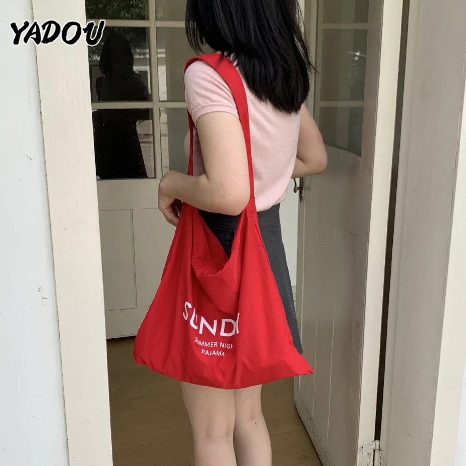 ยาดู เวอร์ชั่นเกาหลีของการออกแบบพิมพ์ตัวอักษรเฉพาะผ้าใบกระเป๋าความจุขนาดใหญ่พร็อพกระเป๋าสะพายสีลูกกวาด