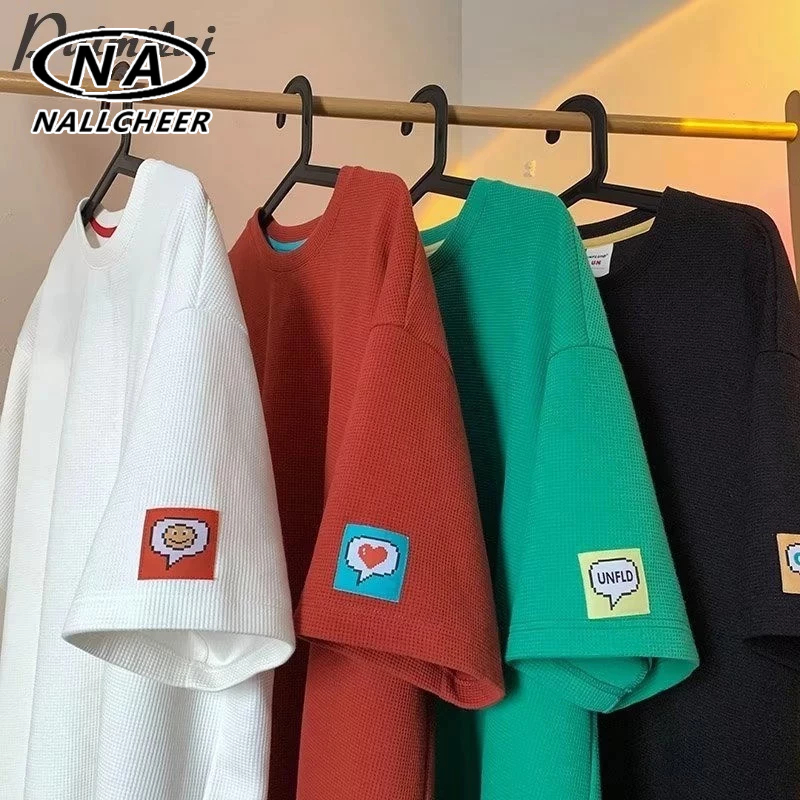 เสื้อยืดแขนสั้นผู้ชาย ญี่ปุ่นวาฟเฟิลหลวมอเนกประสงค์ลําลองครึ่งแขน