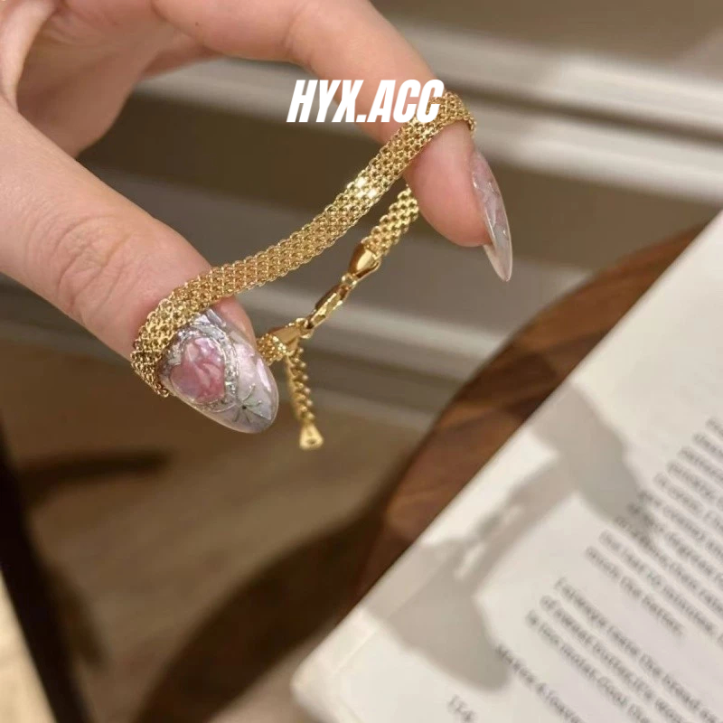 สร้อยข้อมือสุภาพสตรีสร้อยข้อมือเหล็กไทเทเนียมถักสีทองวินเทจ