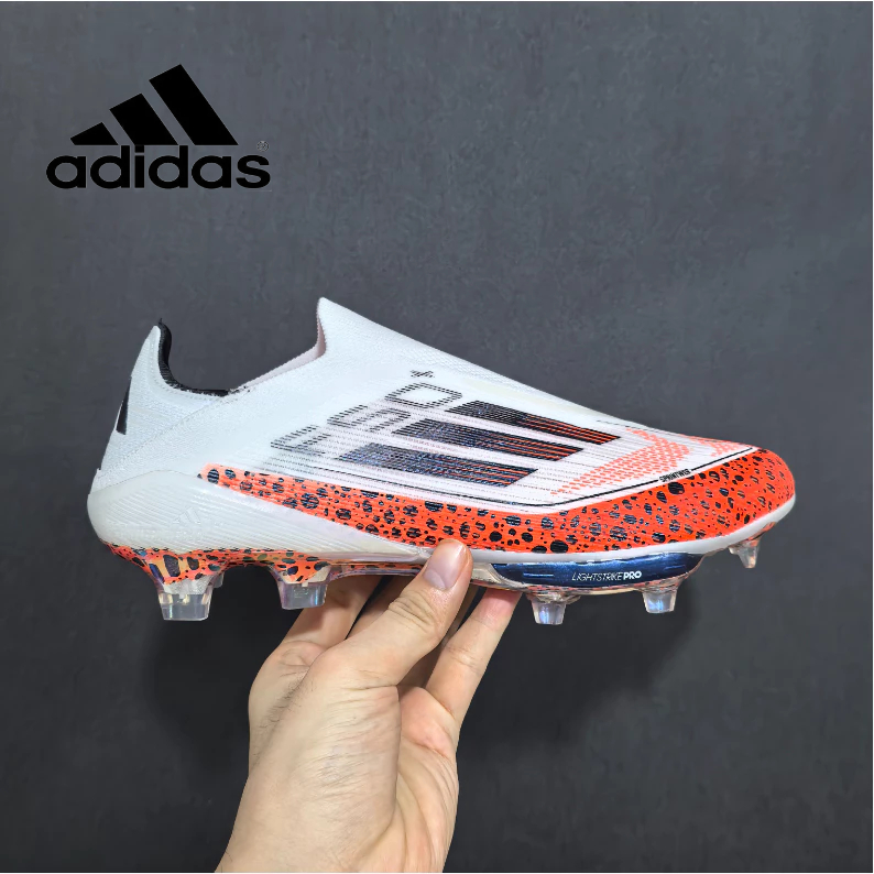 F50+light STRIKE PRO Elite FG ผู้หญิงขนาด 36-45 ผู้ชายรองเท้าฟุตบอลถักกลางแจ้ง Anti Slip และทนต่อการสึกหรอรองเท้าฟุตบอล