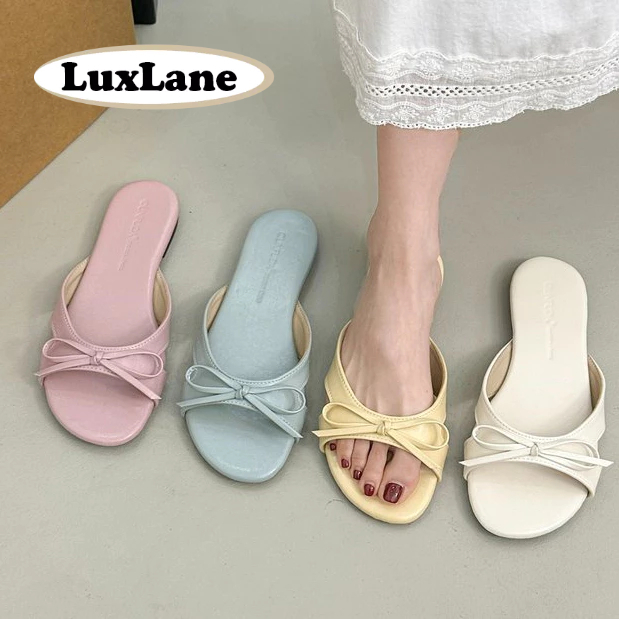 S.LuxLane French Fairy Bow รองเท้าแตะแบน Slip-On รองเท้าแตะชายหาดฤดูร้อนสําหรับวันหยุดสวมใส่ทุกวัน Commute (สีเบจ/สีม่วง/สีเหลือง,ขนาด 35-40)