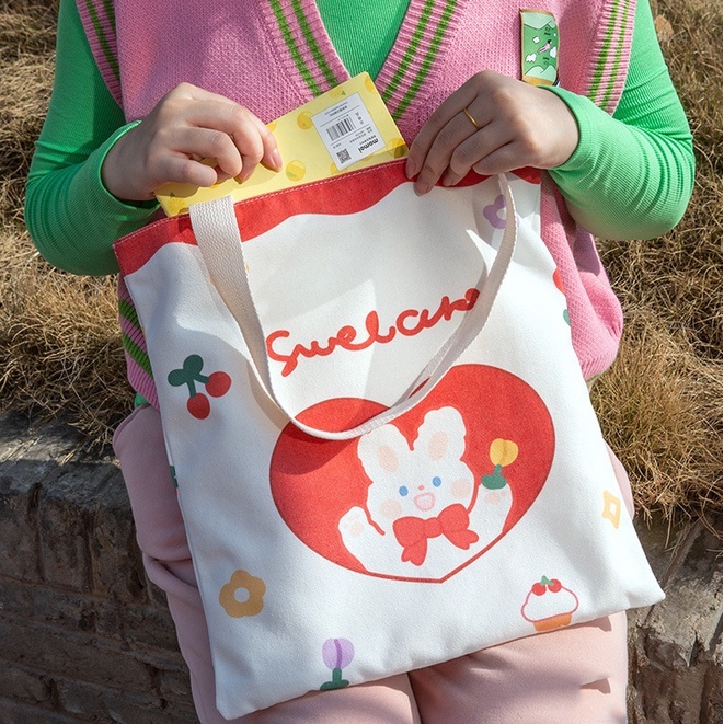🍓Olivia🍓กระเป๋าถือ กระเป๋าผ้า สไตล์เกาหลี แฟชั่นมา การ์ตูน-น่ารัก พร้อมส่ง #BAG01