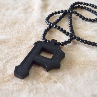 P necklace.