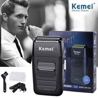 Kemei KM-1102 แบบชาร์จไร้สายเครื่องโกนหนวดสำหรับผู้ชายใบมีดแฝดลูกสูบเครามีดโกนใบหน้าดูแลมัลติฟังก์ชั่ที่แข็งแกร่ง T Rimm