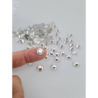 เพชรคคริสตัลก้นแบนและเพชรคริสตัลก้นตัดสีขาวเนื้อเงางามเหมือน…