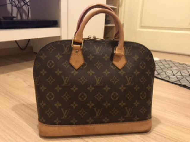 louis vuitton alma used