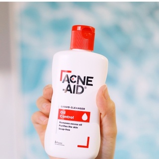 acne-aid 100มล.สีแดง ช่วยลดสิวเเละความมันบนใบหน้า