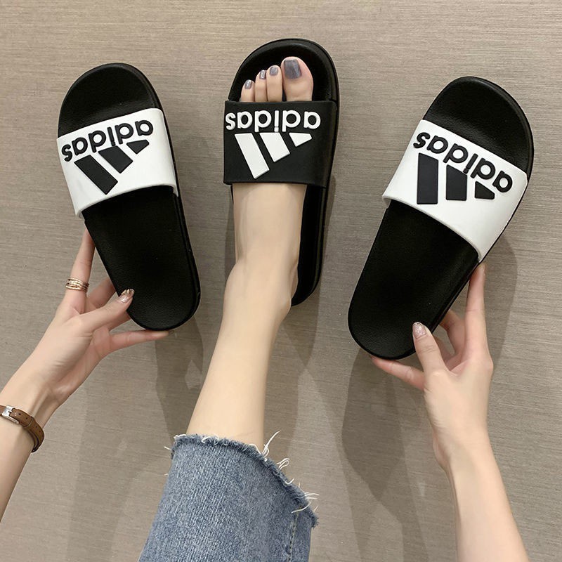 Fashion home slippers รองเท้าแตะแบบสวม ใส่ได้ทั้งผู้ชาย ผู้หญิง TXB14