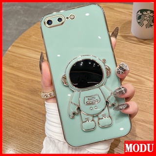 Modu เคสโทรศัพท์มือถือชุบไฟฟ้า ลายนักบินอวกาศ หรูหรา พร้อมขาตั้ง สีมาการอง สําหรับ Apple iPhone 6 6S Plus 7 8 SE2020 X XS XR XS Max