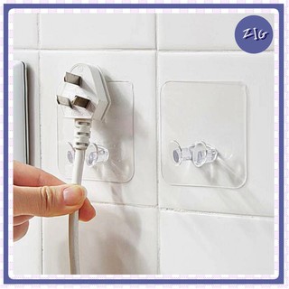 ZIGSHOP - (2 ชิ้น / 10 ชิ้น) T-PLUG-HOLDER ที่แขวนหัวปลั๊ก ที่จัดระเบียบหัวปลั๊กไฟ กาวนาโน ลอกออกได้ ไม่เป็นคราบ