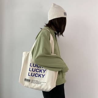 กระเป๋าผ้า เเบบถือเเละสะพายข้าง LUCKY พร้อมส่ง