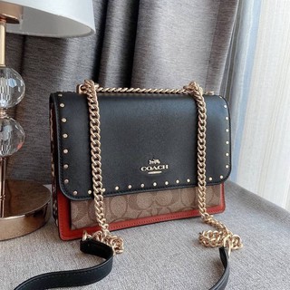 KLARE CROSSBODY IN SIGNATURE CANVAS WITH RIVETS (COACH 90400)