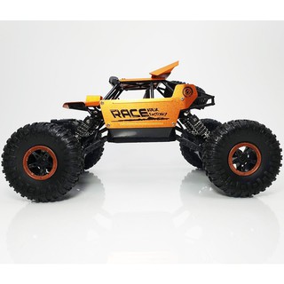 รถบังคับวิทยุ รถไต่หิน MONSTER ROCK CRAWLER ตัวรถสวยงามมาก มีสปอยเลอร์หลัง  อัตราส่วน 1:18 – JD TOYS – 699-107 (สีส้ม)