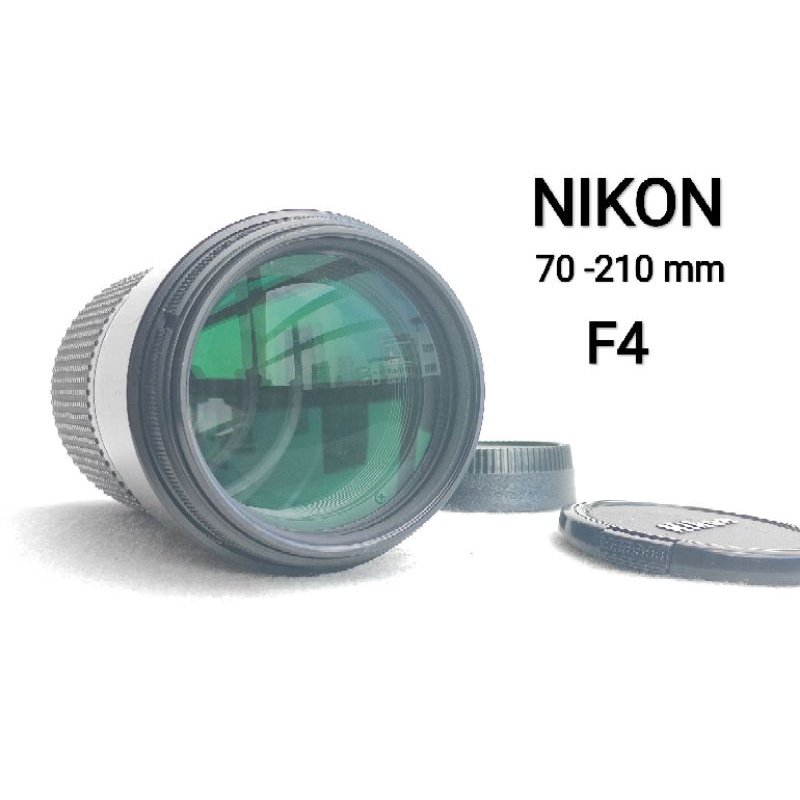 เลนส์ Nikon Nikkor Af zoom 70-210 mm f4 ตลอดช่วง  macroเมาท์ nikon  Excellent ++พร้อมฝา หน้า ท้าย Rear item
บอดี้ดำ