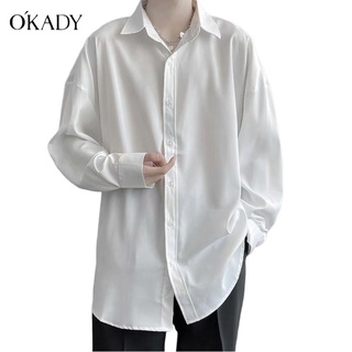 OKADY เสื้อแขนยาว สไตล์ฮ่องกง ฤดูใบไม้ผลิและฤดูใบไม้ร่วง ใหม่ เสื้อแฟชั่น เวอร์ชั่นเกาหลี ปก เสื้อคู่ เสื้อคู่ เสื้อนอก เสื้อ เสื้อเชิ้ตผู้ชายแขนยาว