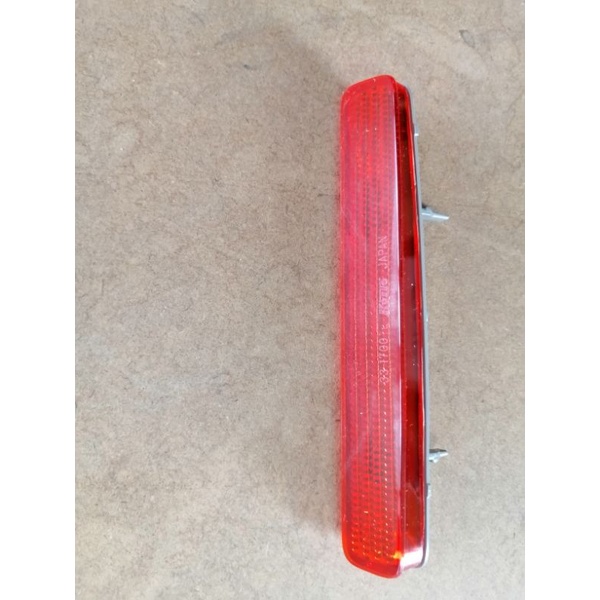 Myvi SE 07 แผ่นสะท้อนแสงกันชนหลัง RH OEM (KOITO-JAPAN)